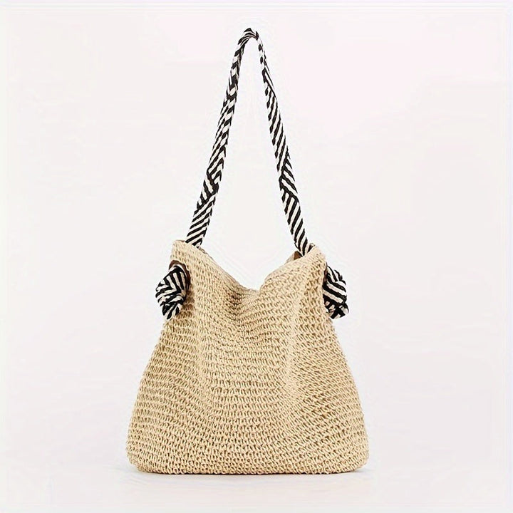 BIRTE - GEFLOCHTENE TASCHE MIT GRIFFEN