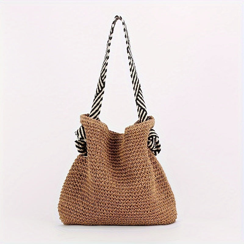 BIRTE - GEFLOCHTENE TASCHE MIT GRIFFEN